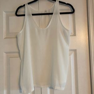White sleeveless blouse